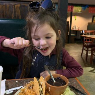 Taco Tuesday. Yes, that is cheese sauce she is covered in. Who doesn’t like queso.