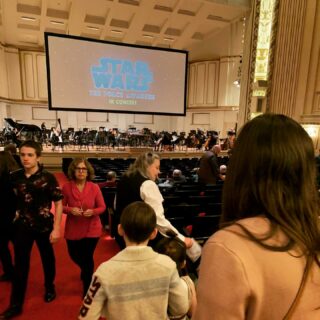 Big night. Their first symphony. And my first time buying sour patch kids at the symphony.